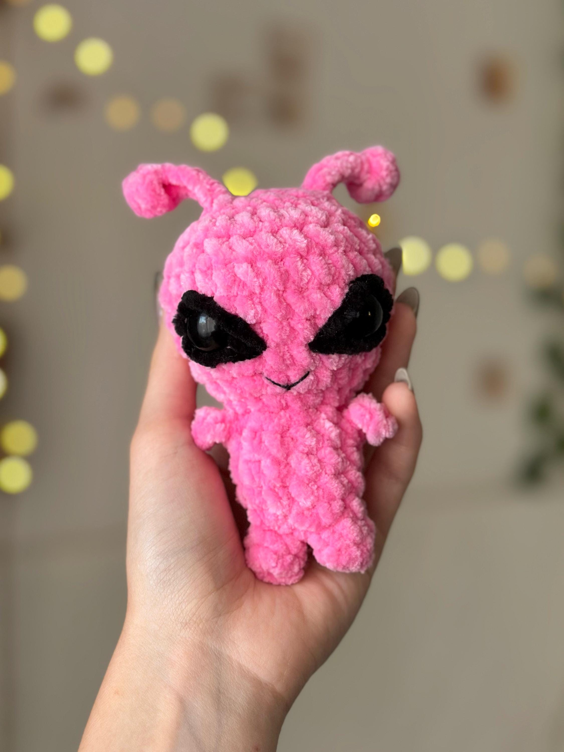 Pink alien plushie