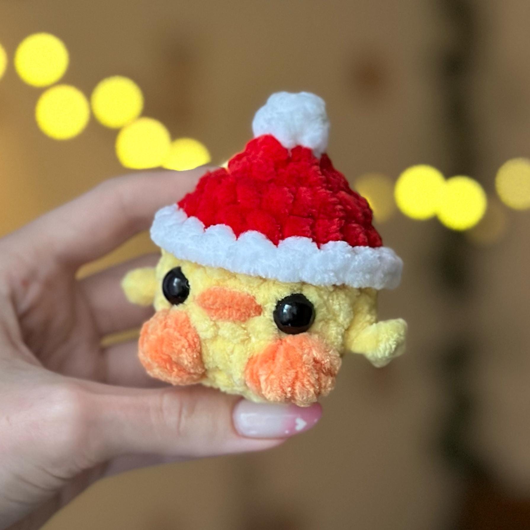 Mini duck in santa hat