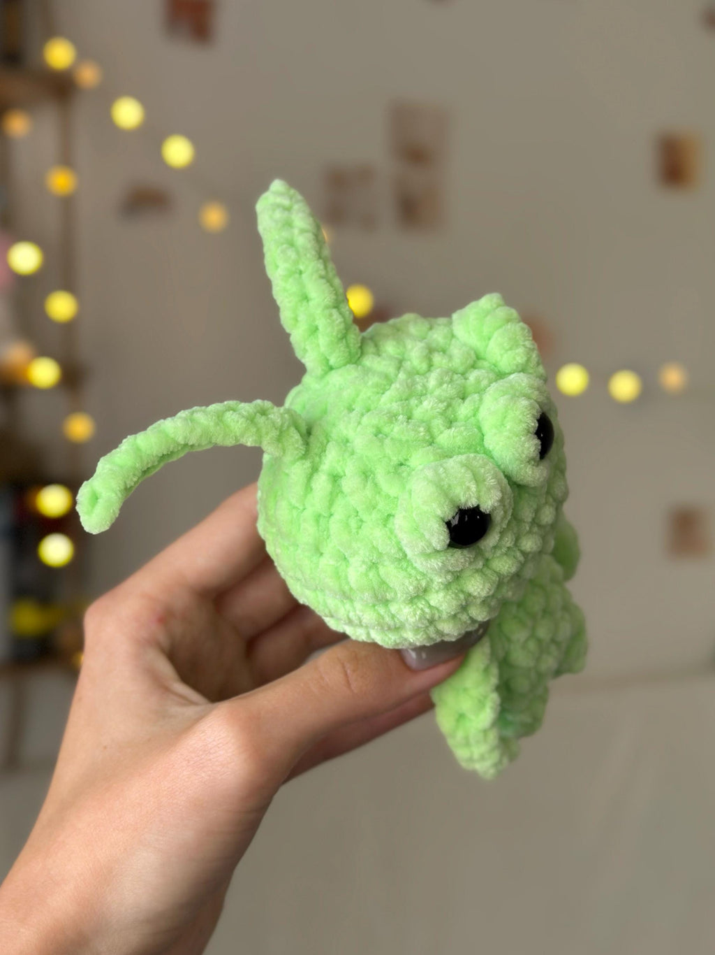 Three-eyed green alien