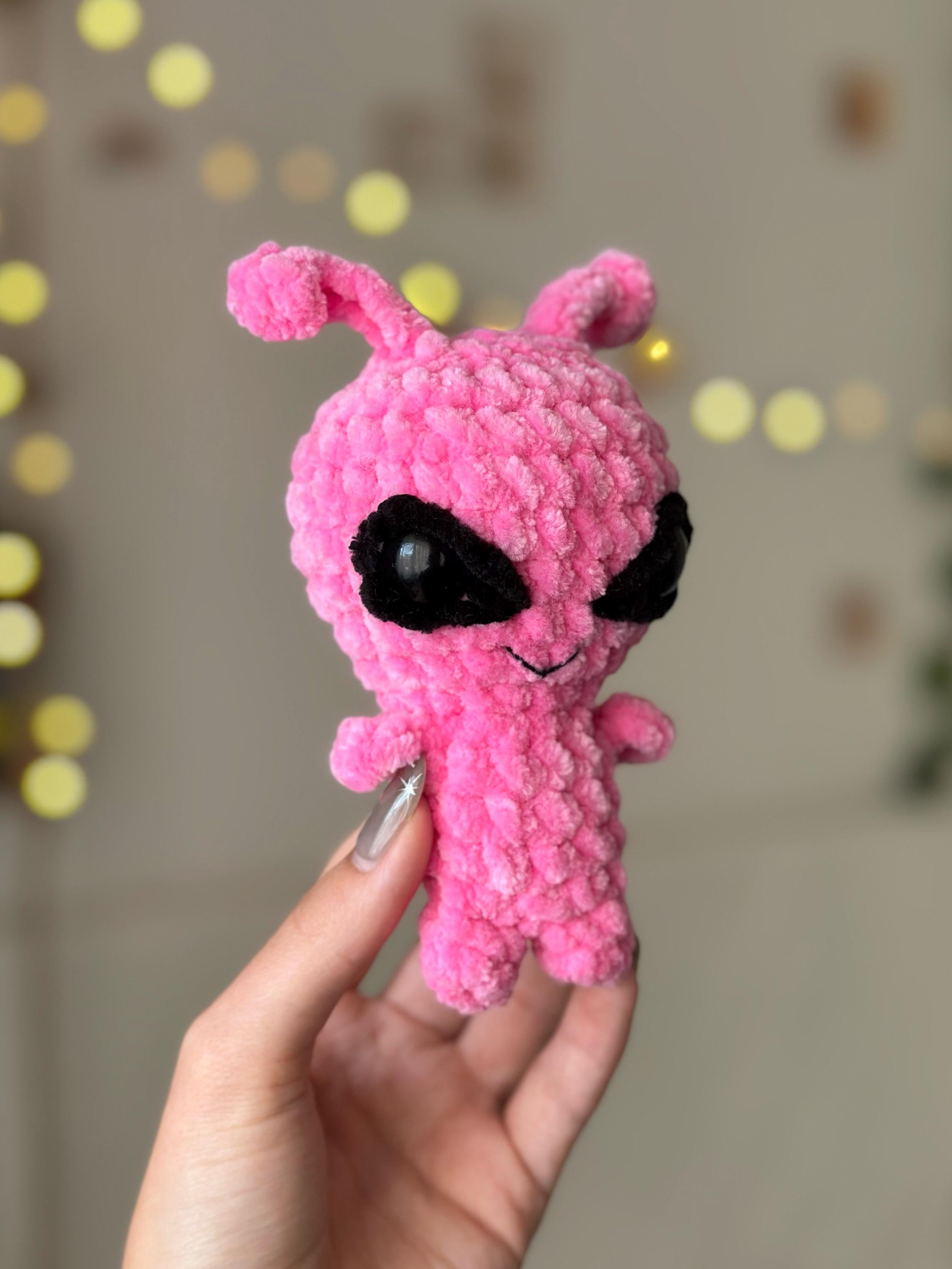 Pink alien plushie