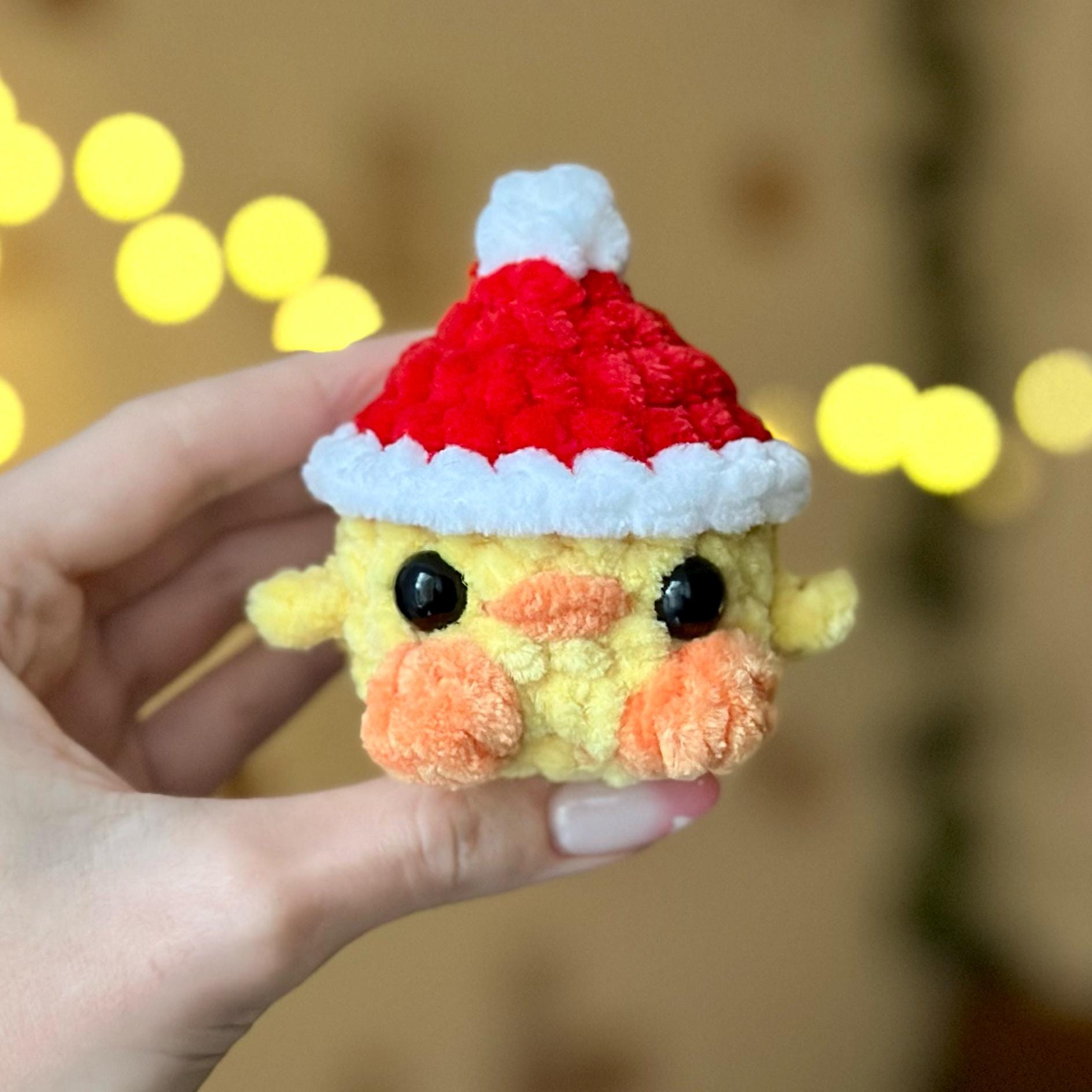 Mini duck in santa hat