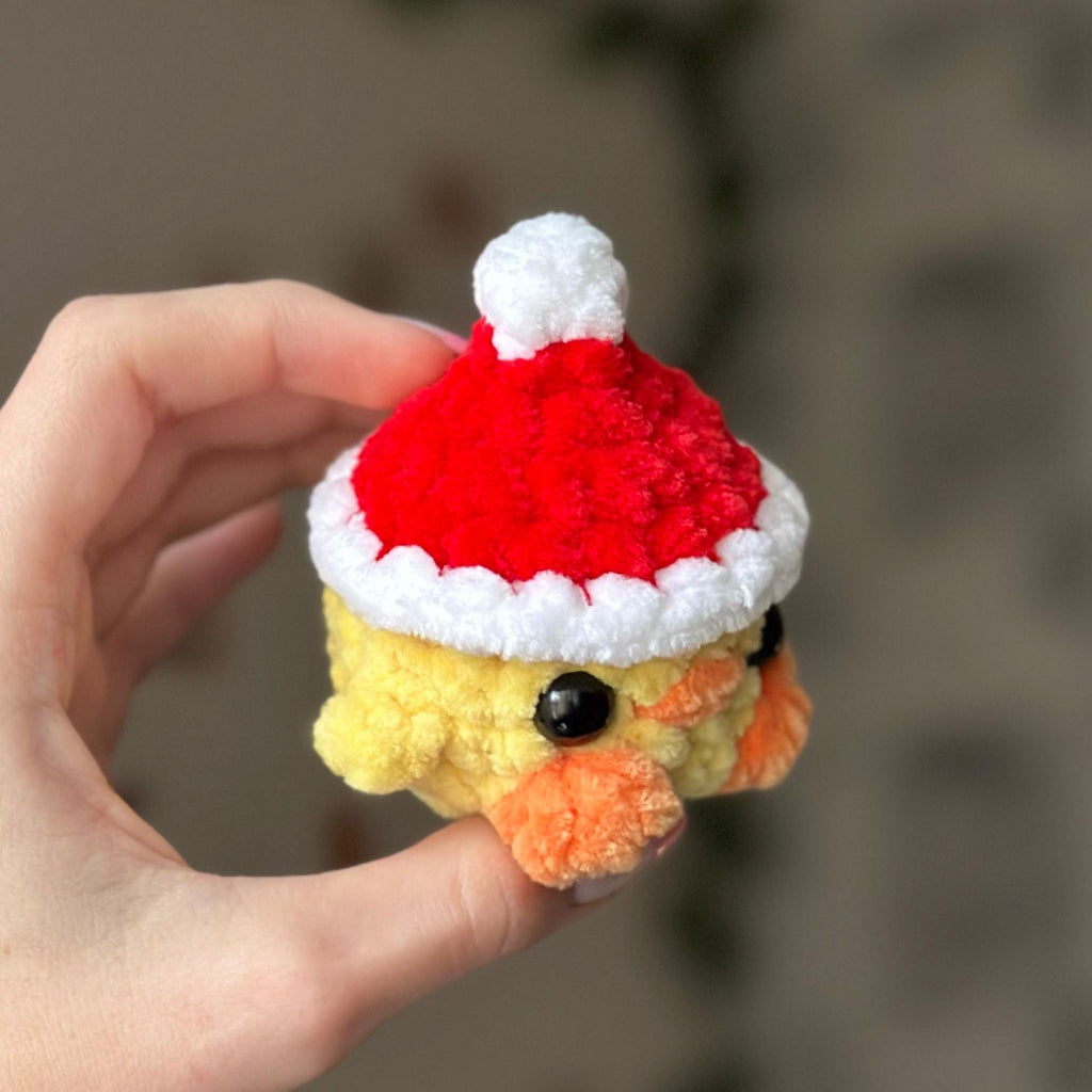 Mini duck in santa hat