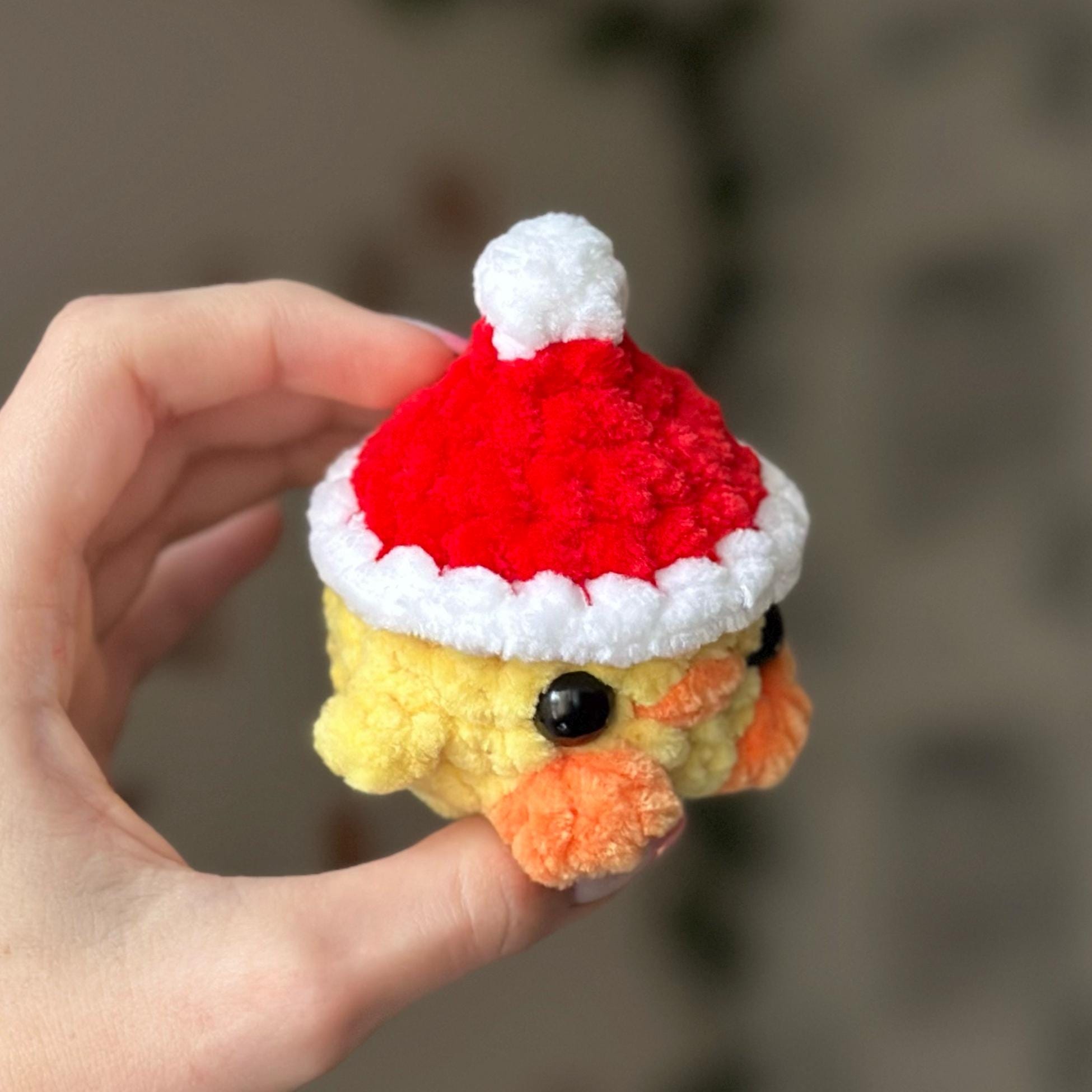 Mini duck in santa hat