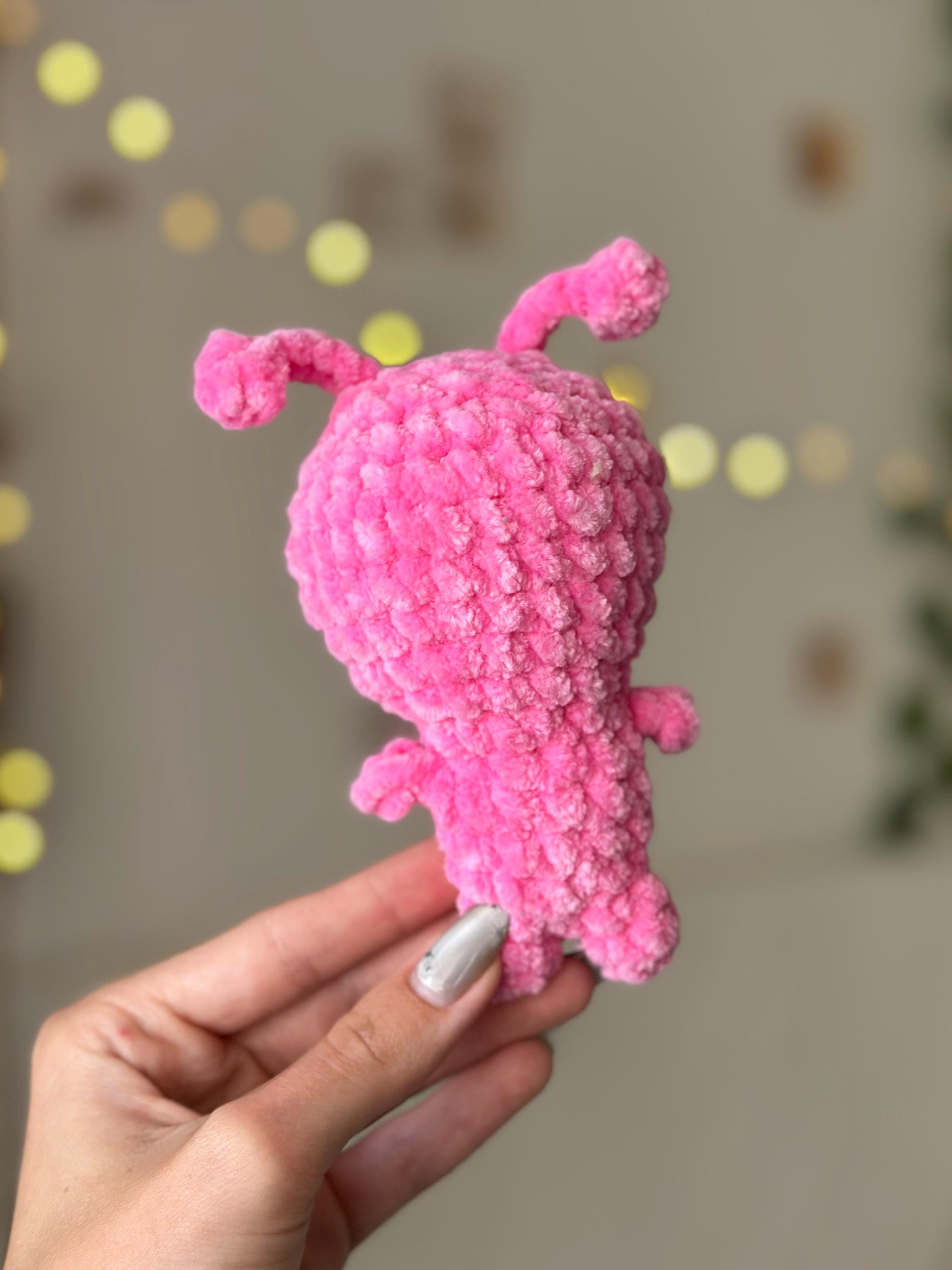 Pink alien plushie