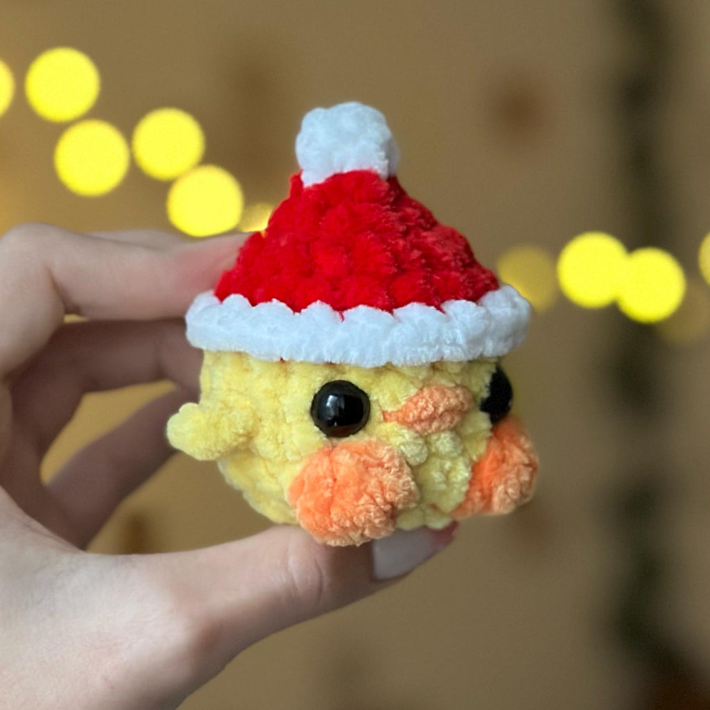 Mini duck in santa hat