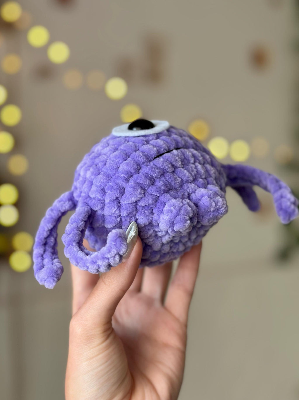 One-eyed purple alien