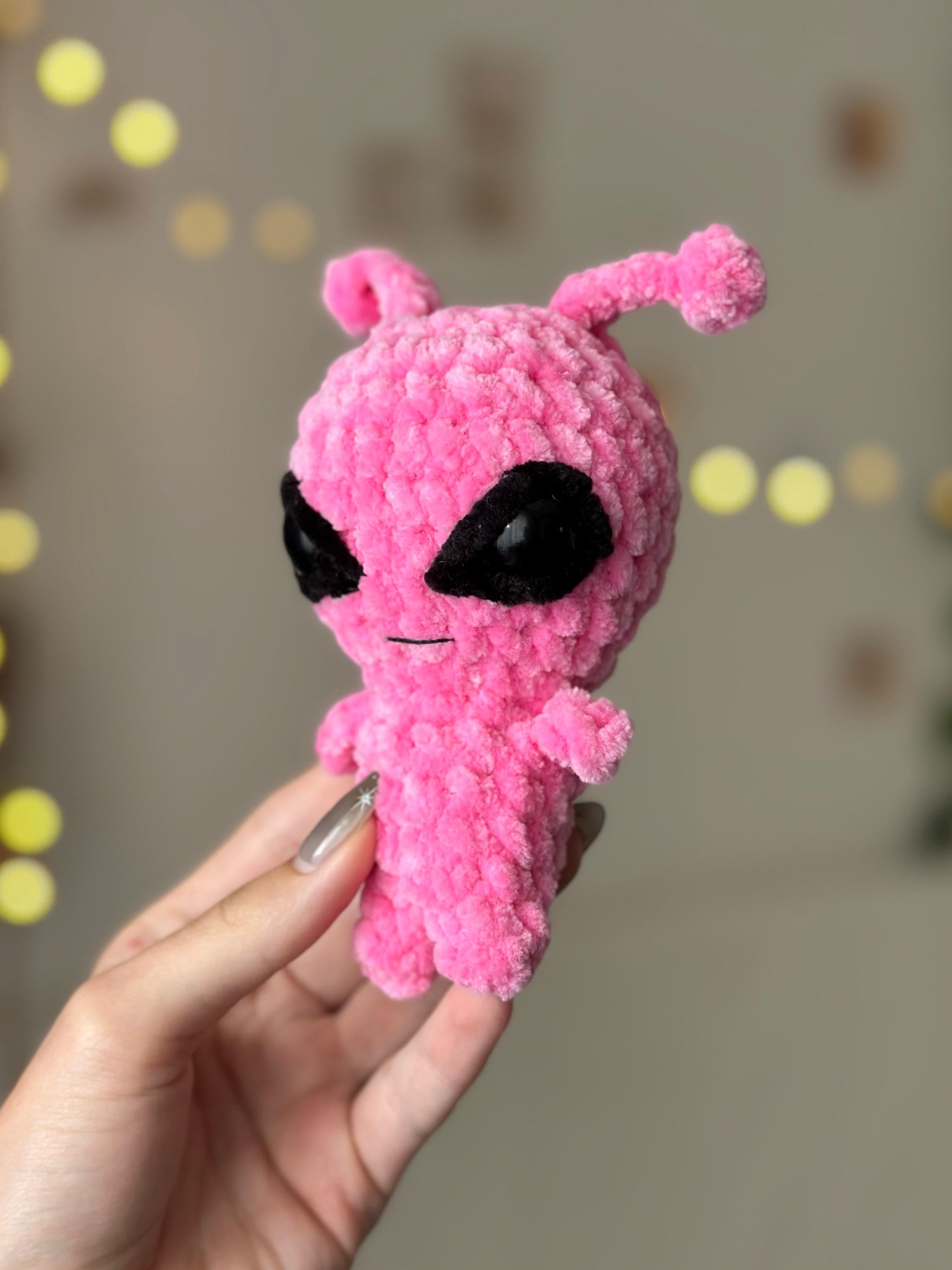 Pink alien plushie