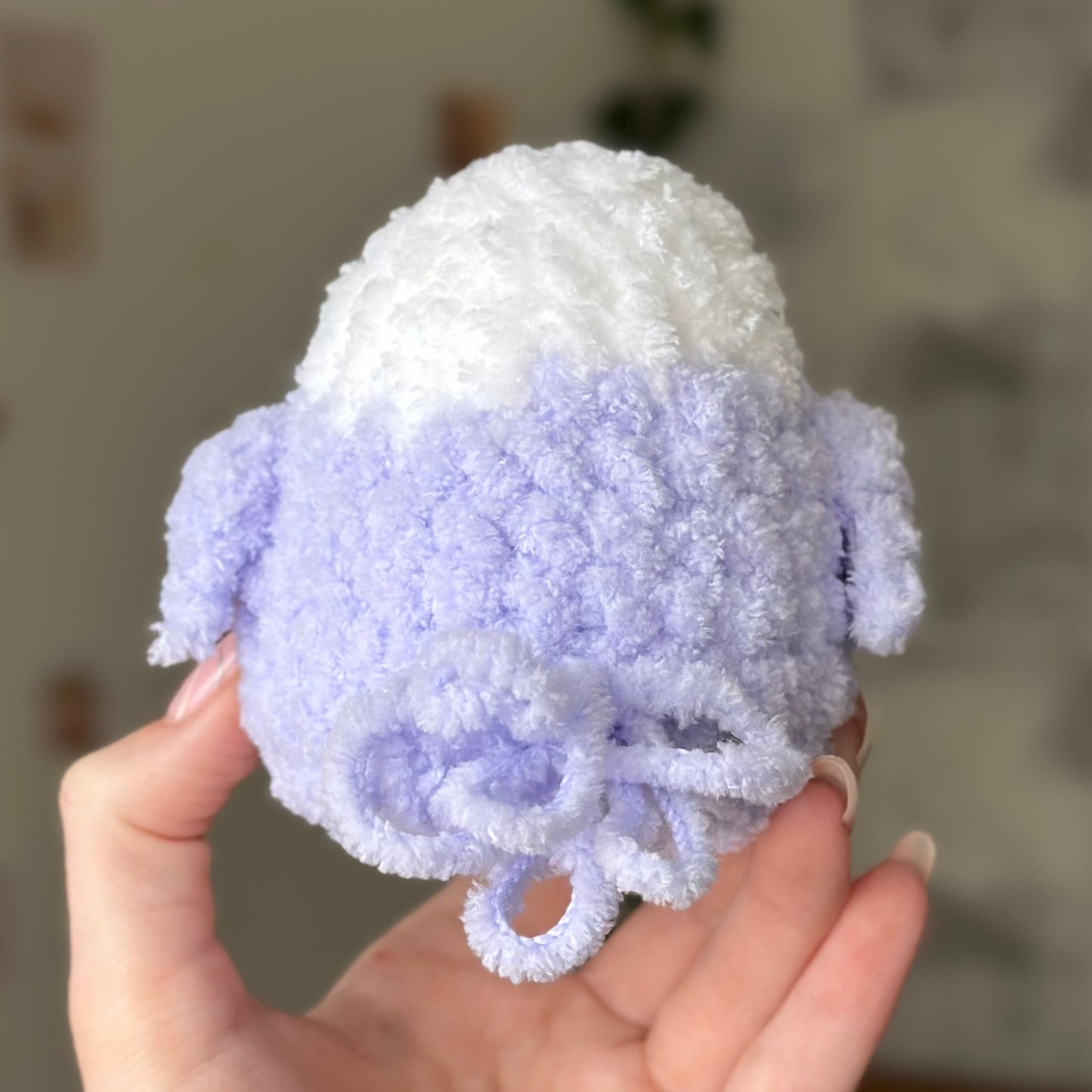 Lavender fluffy bird