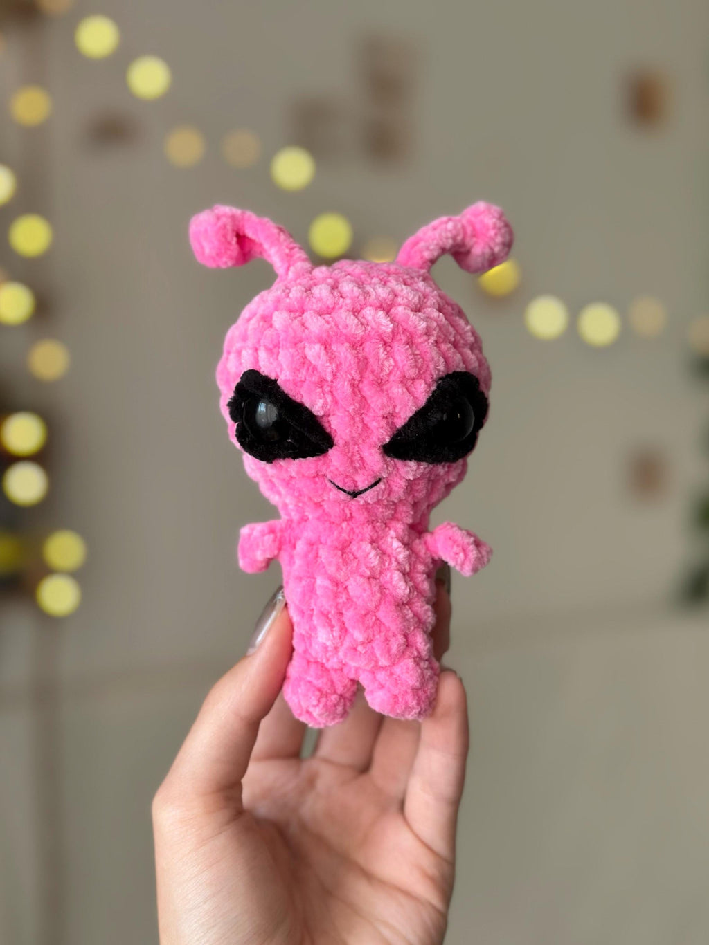 Pink alien plushie