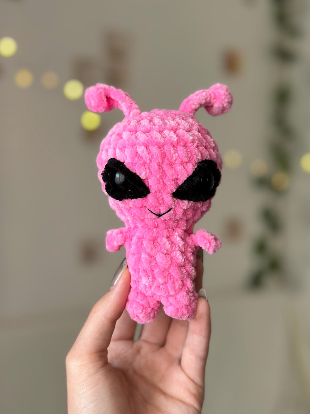 Pink alien plushie