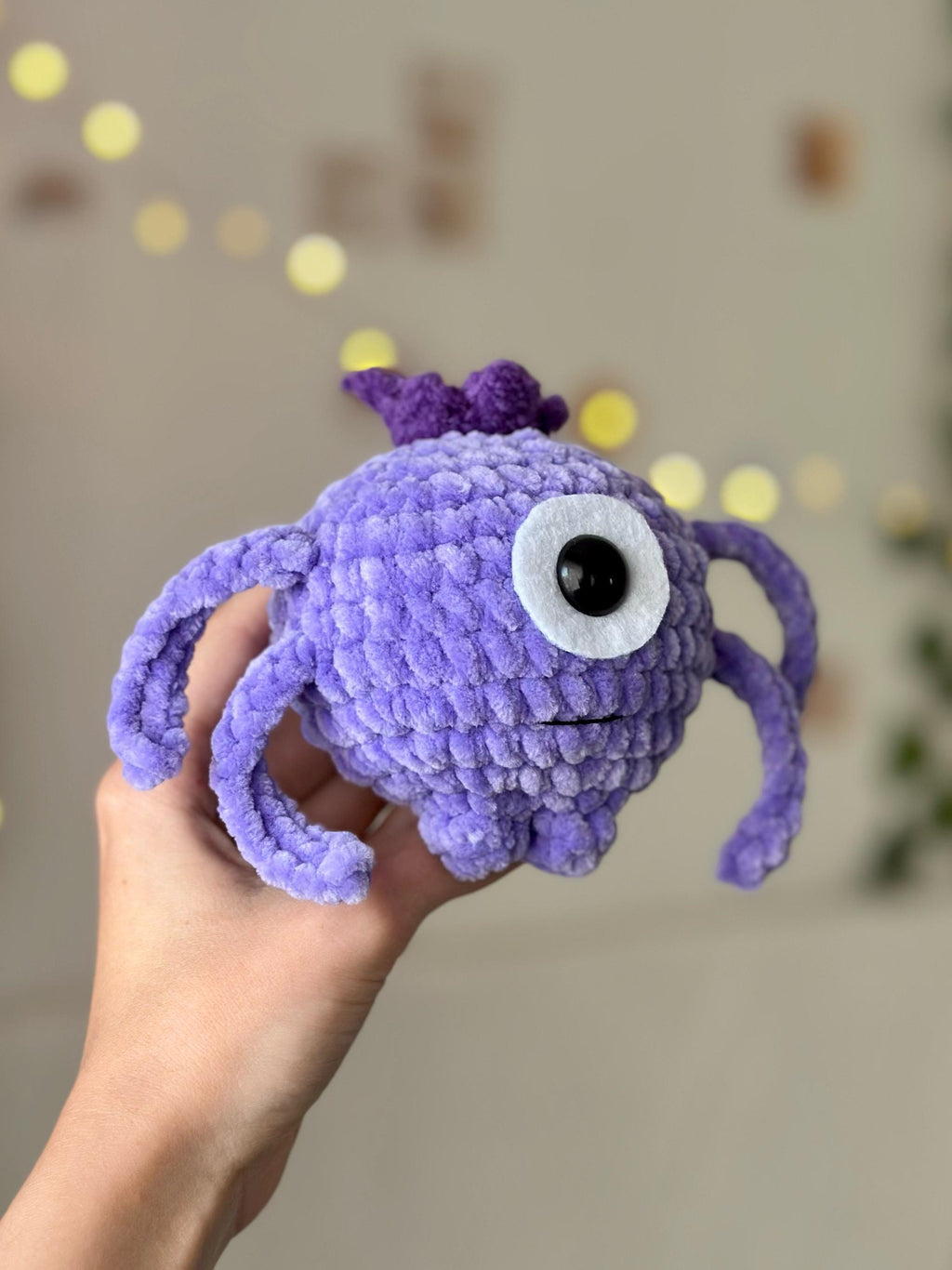 One-eyed purple alien