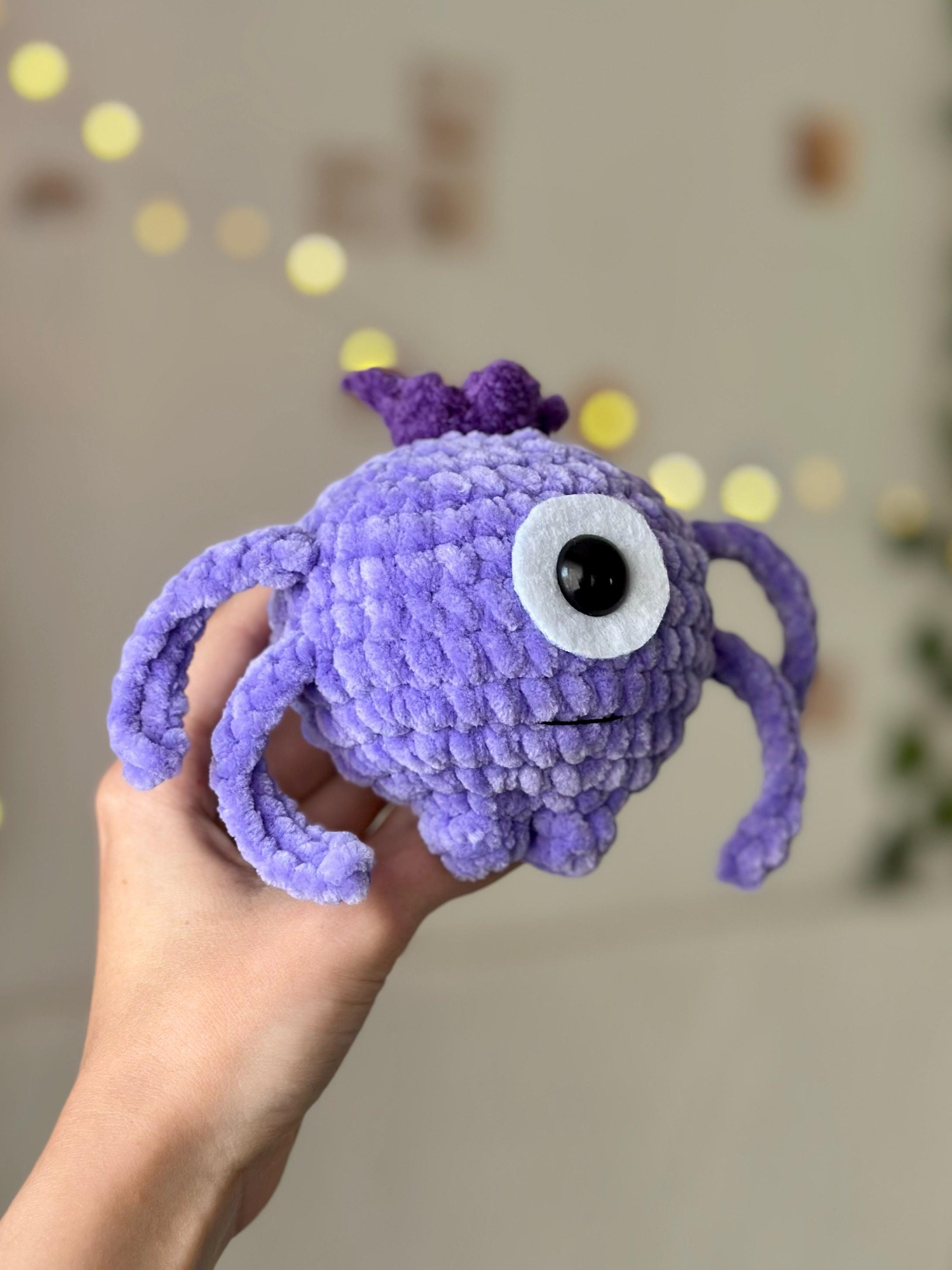 One-eyed purple alien