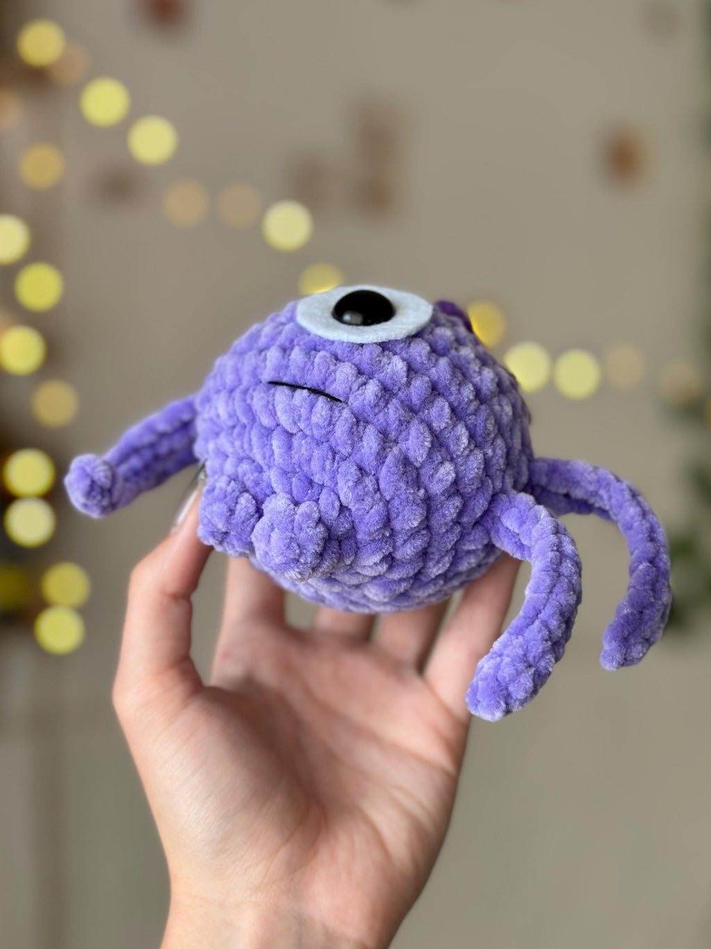 One-eyed purple alien