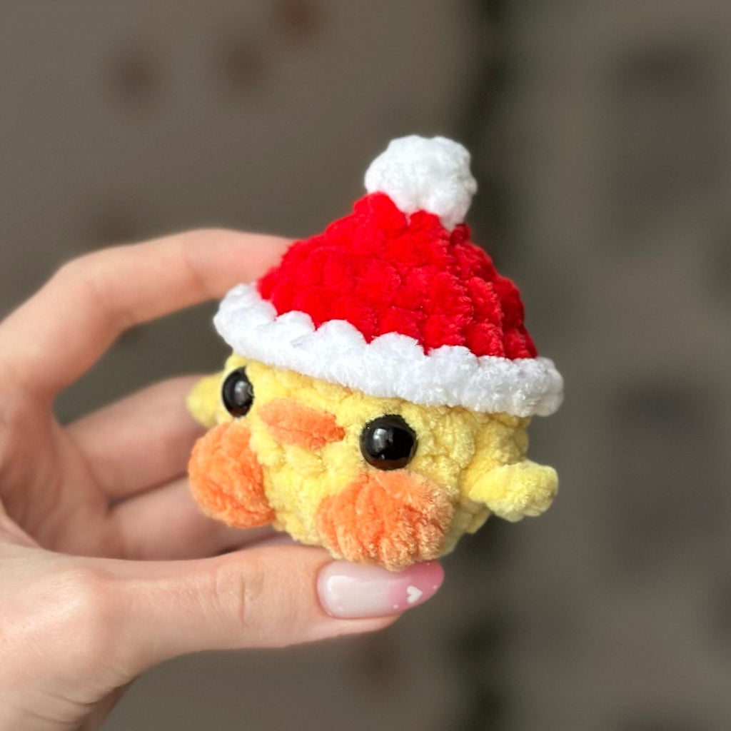 Mini duck in santa hat