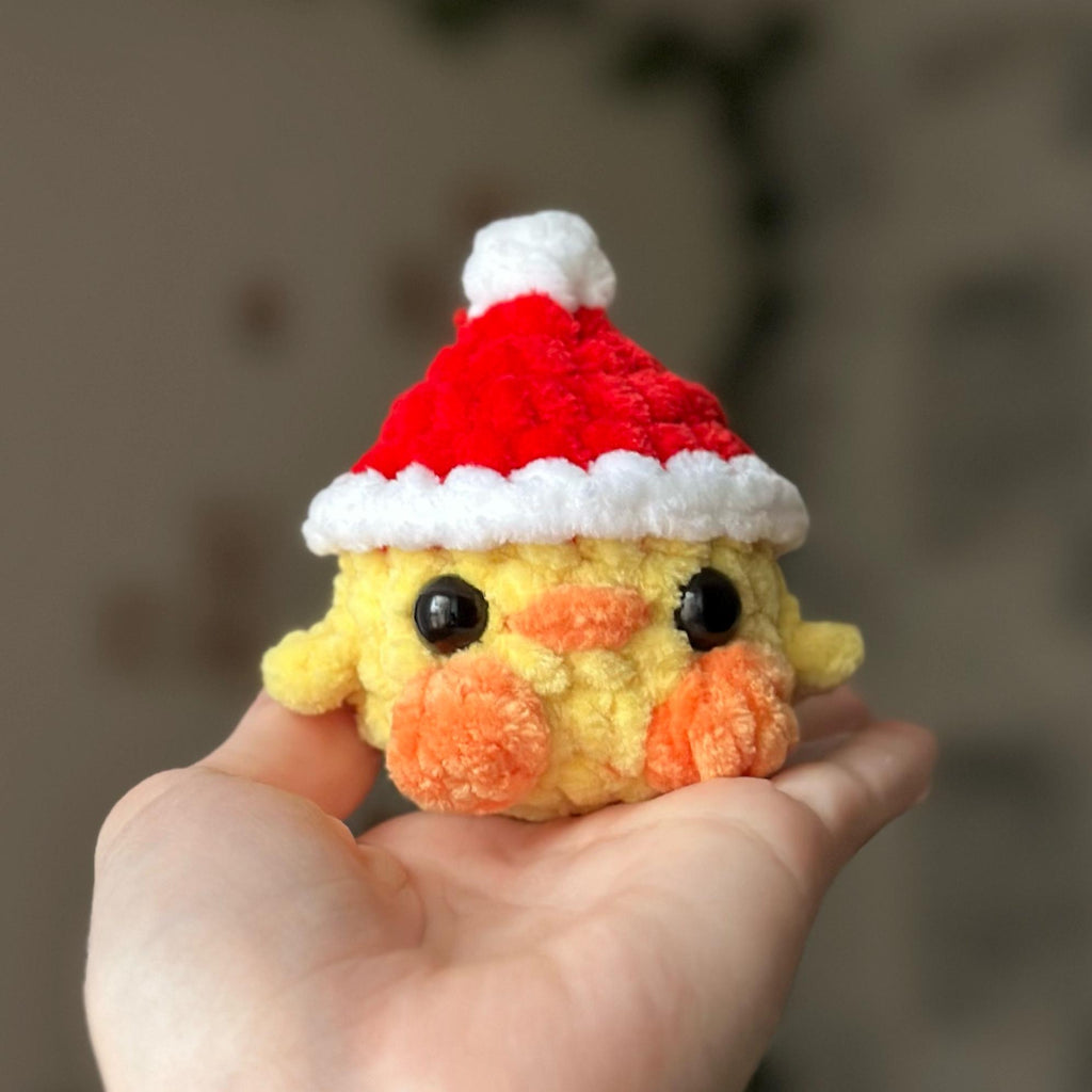 Mini duck in santa hat