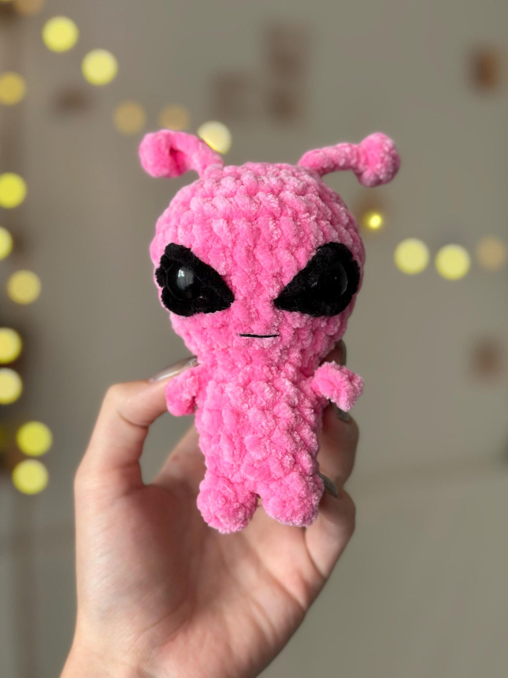 Pink alien plushie