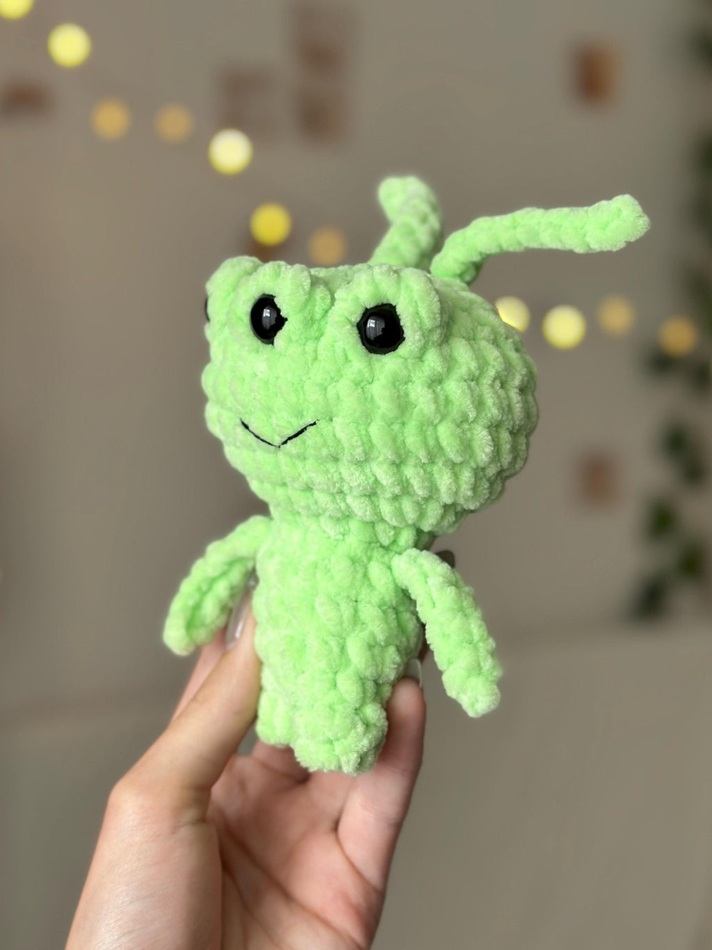 Three-eyed green alien