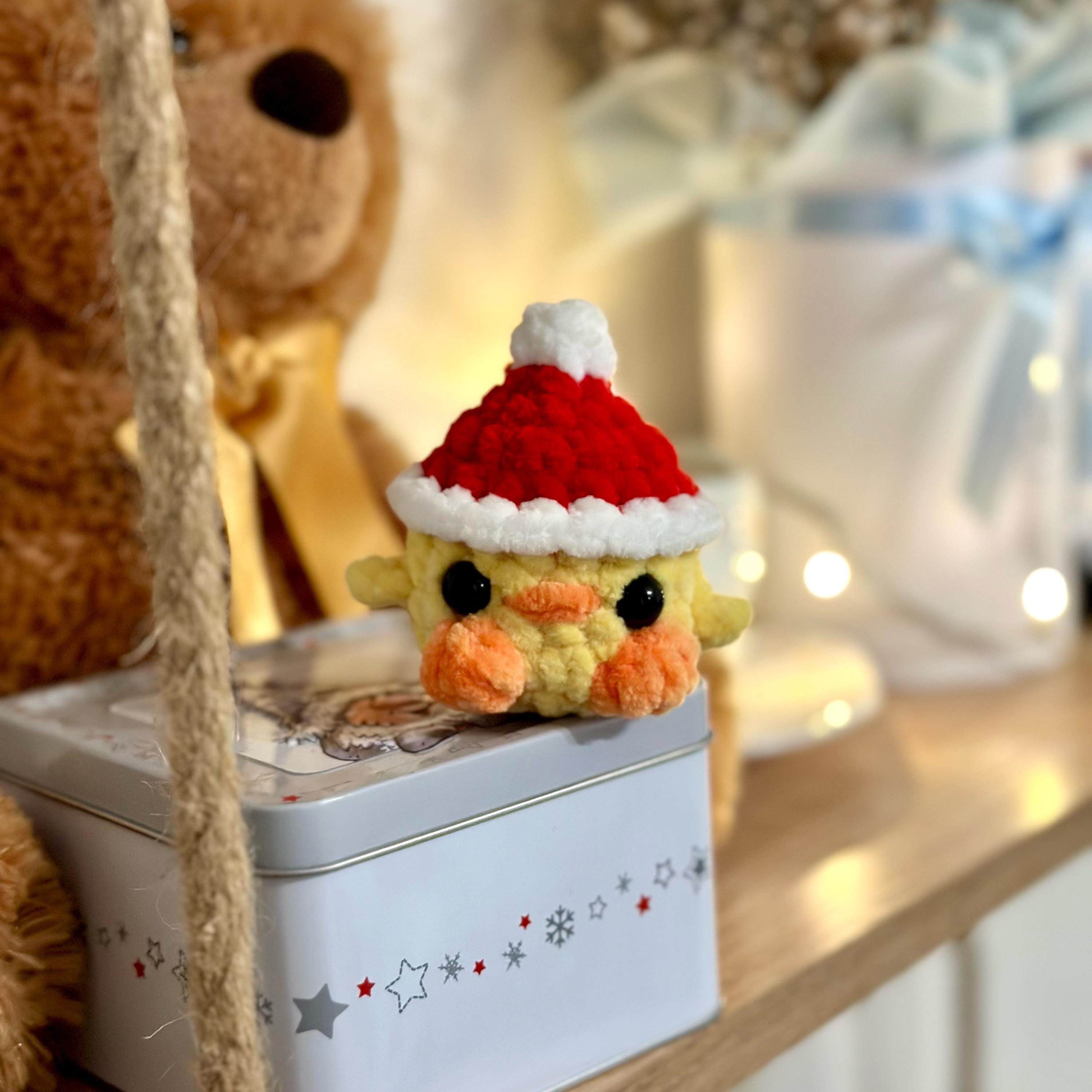 Mini duck in santa hat
