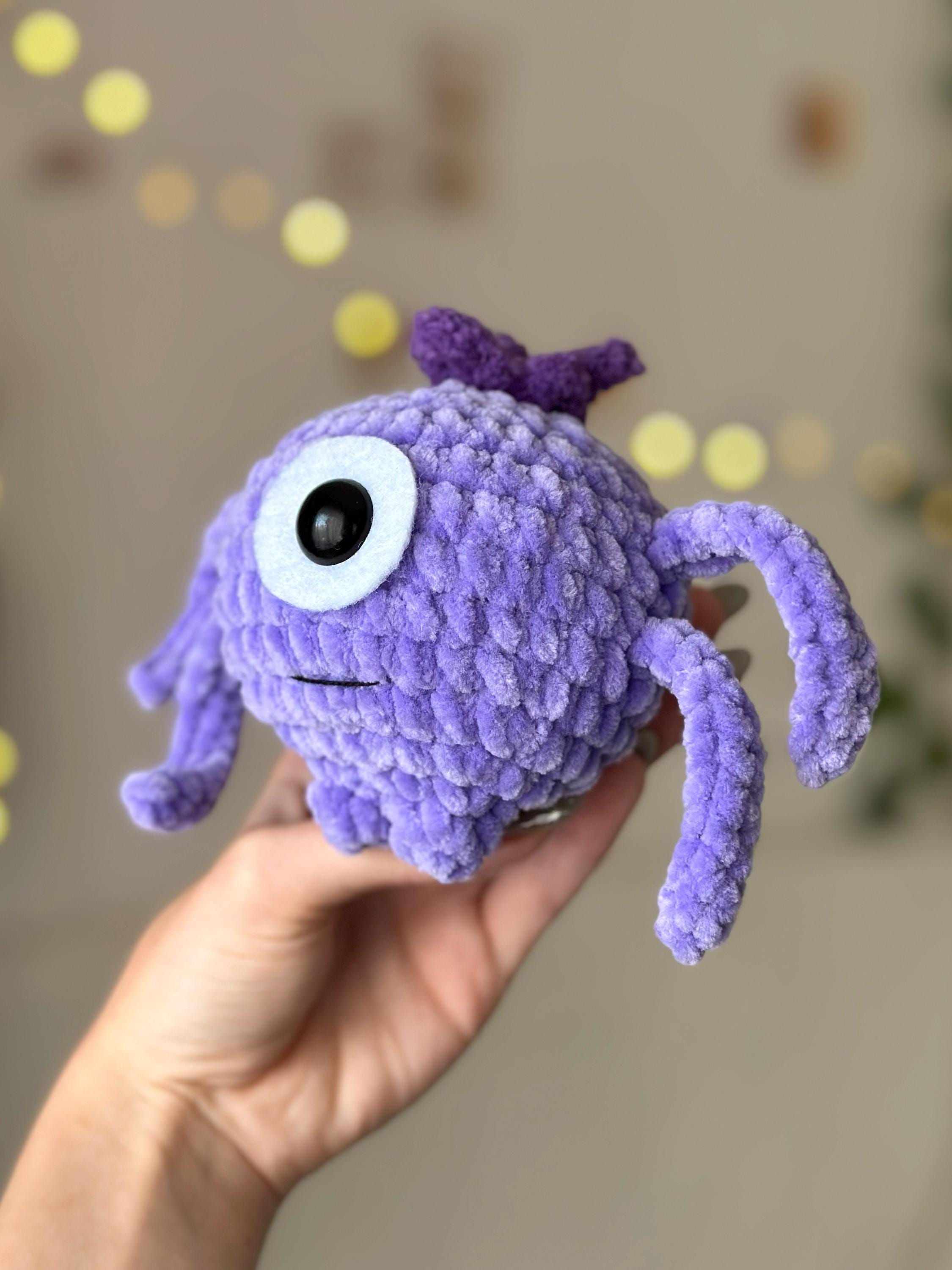 One-eyed purple alien