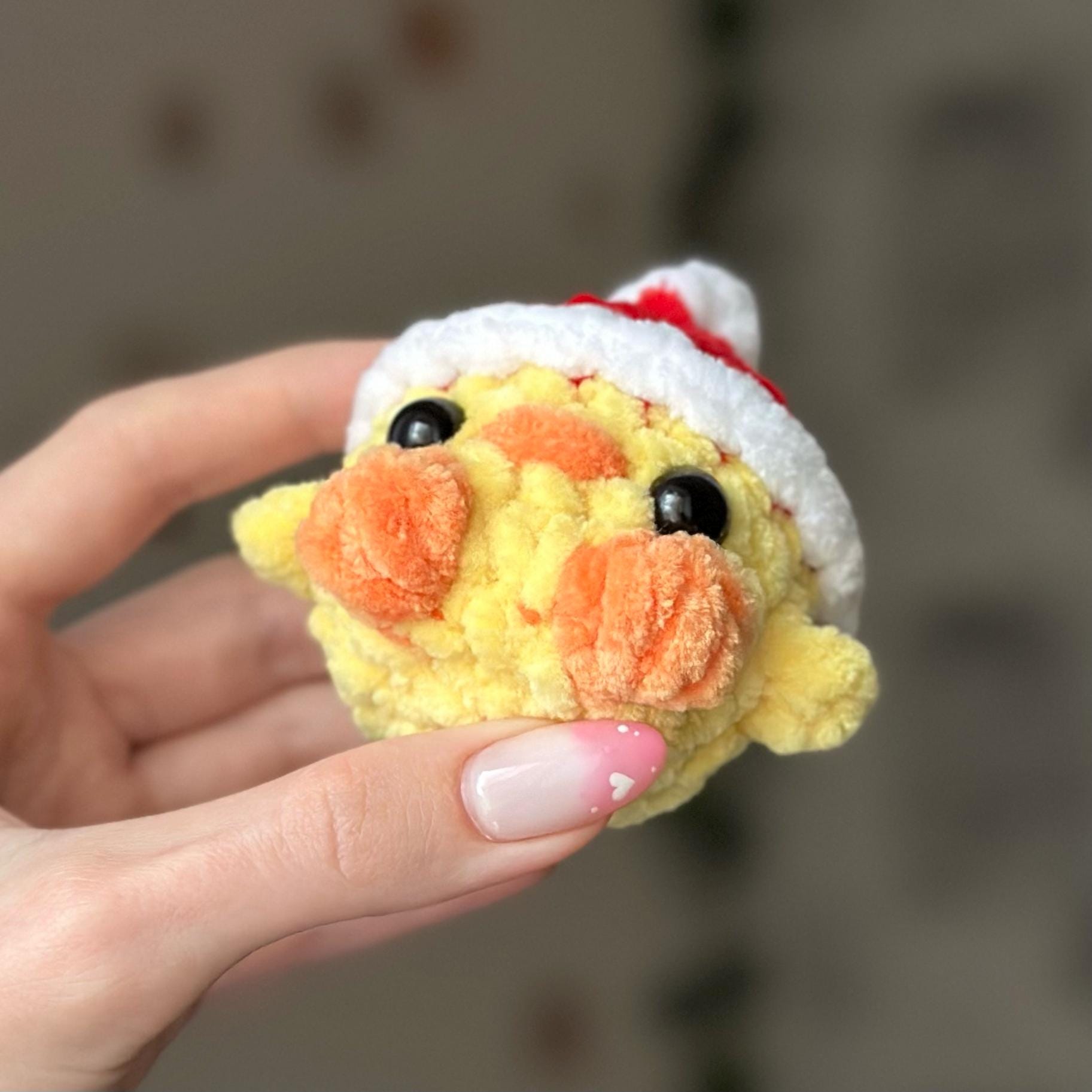 Mini duck in santa hat