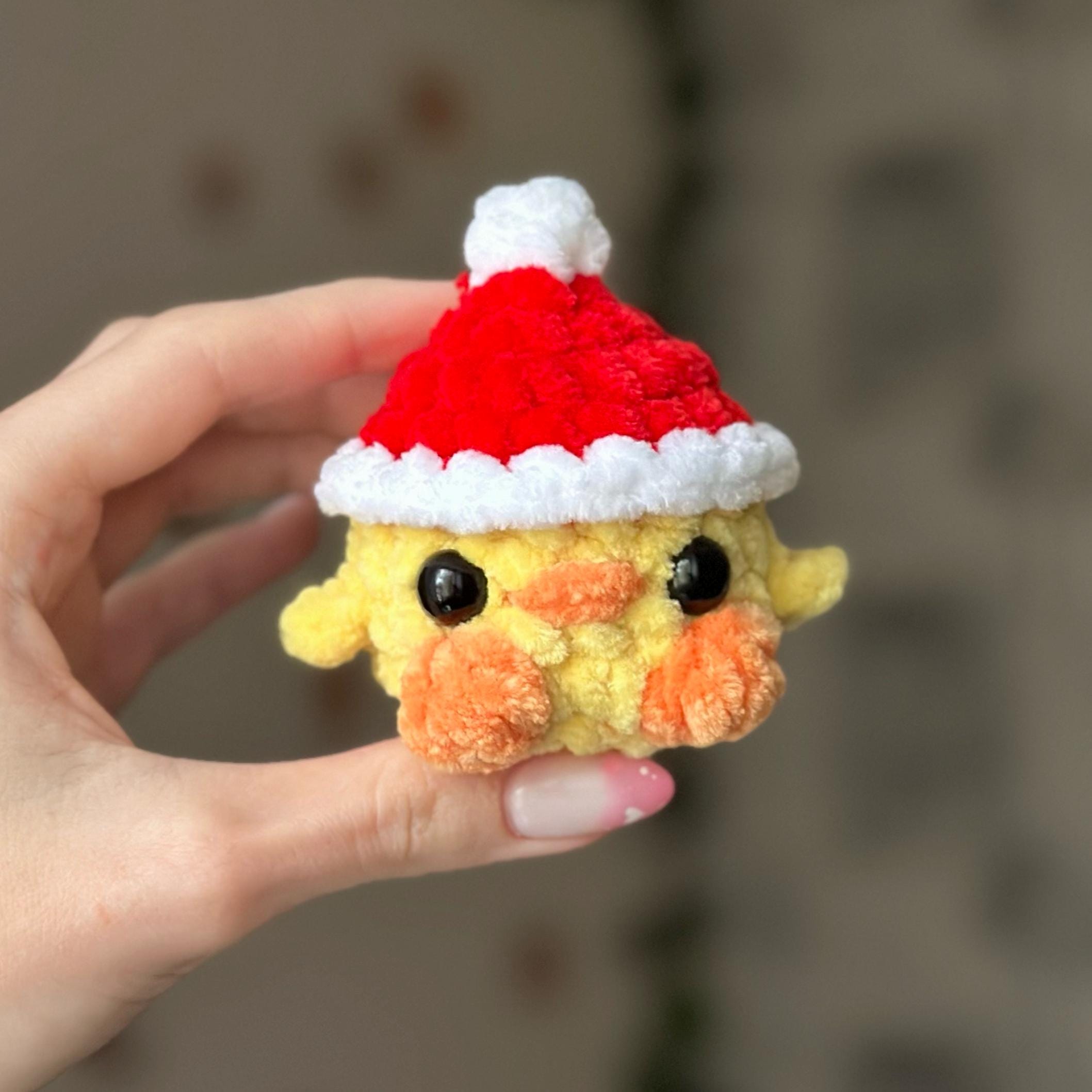 Mini duck in santa hat