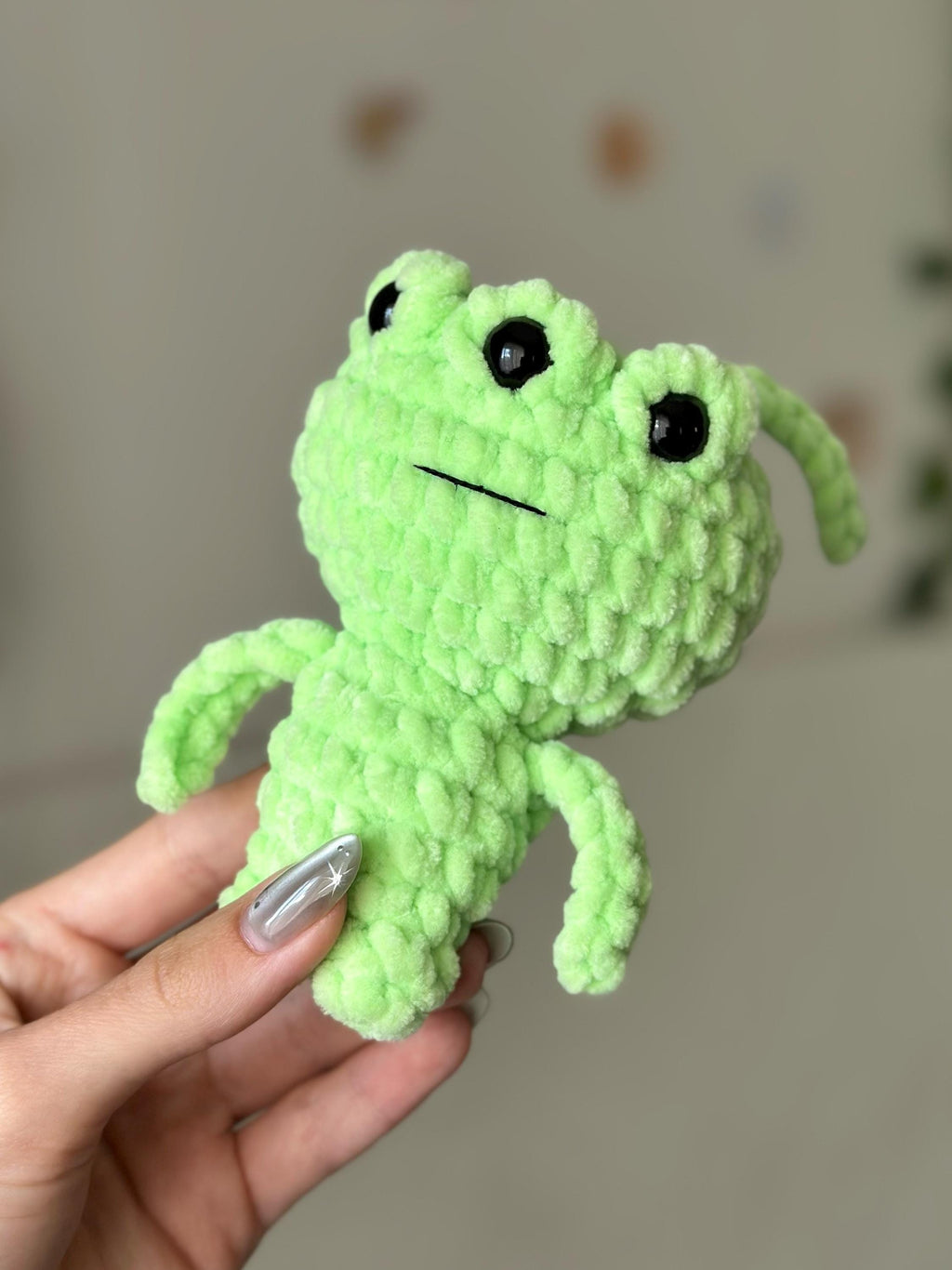 Three-eyed green alien