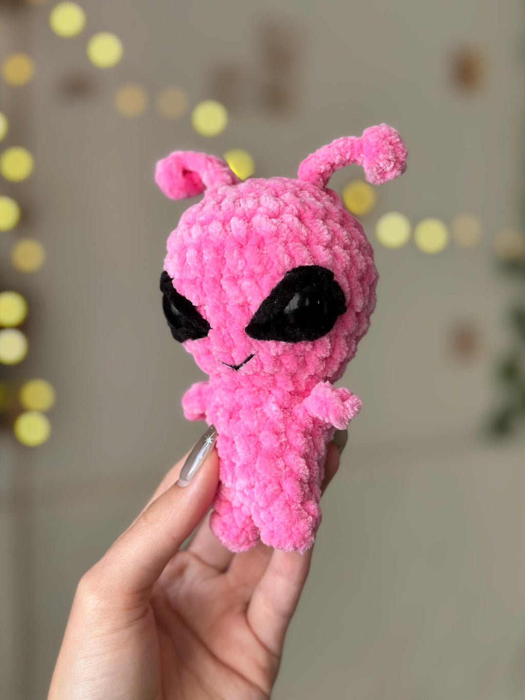 Pink alien plushie
