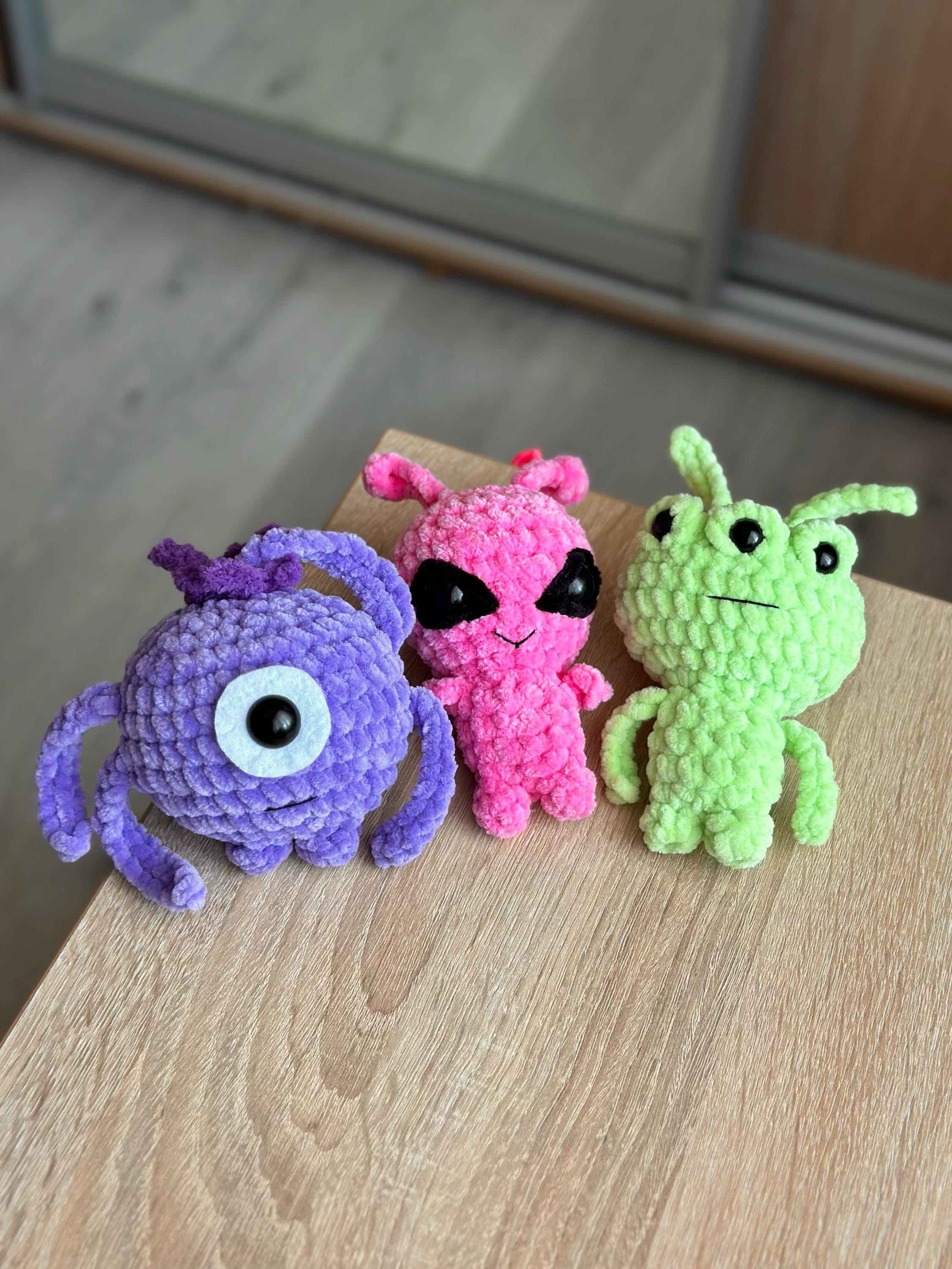 Three-eyed green alien