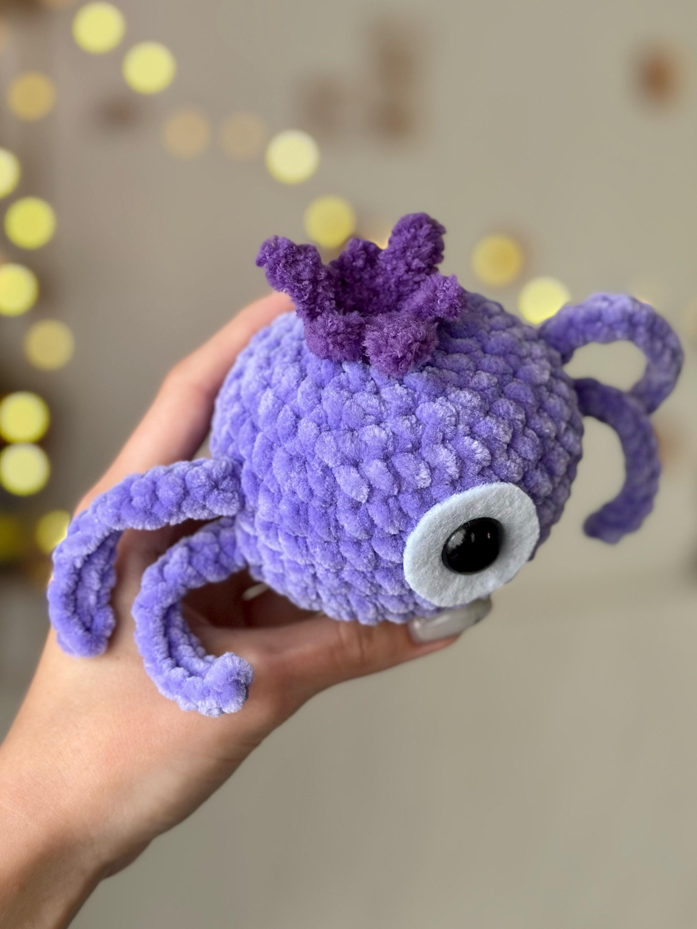 One-eyed purple alien