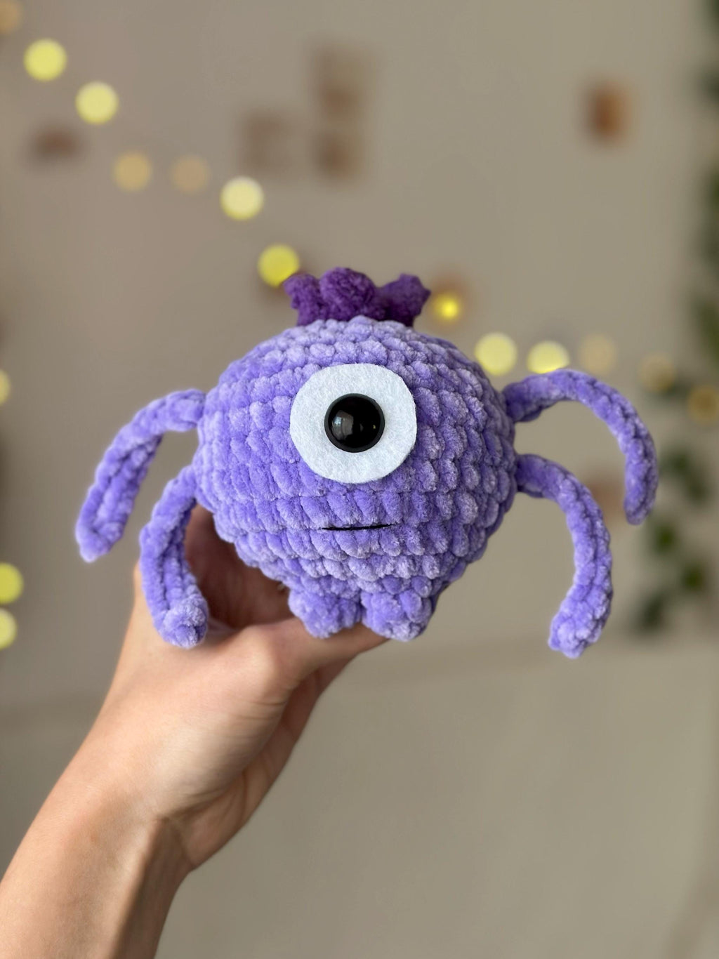 One-eyed purple alien